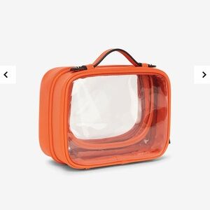 Calpak small cosmetics case in papaya (Orange)